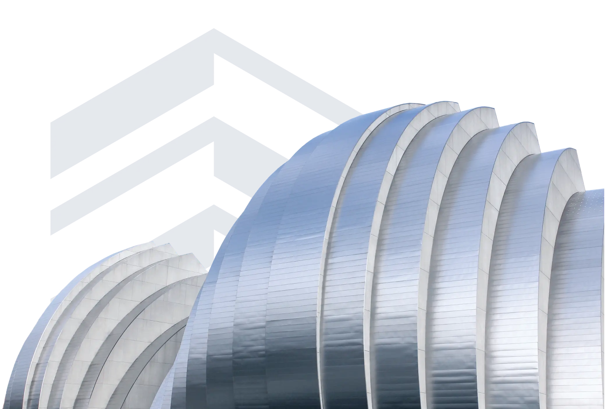 Exterior of the Kauffman Center for the Performing Arts in Kansas City, featuring its curved, shell-like metal architecture against a textured background.